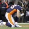 Denver Broncos quarterback Tim Tebow prays after the Broncos defeated the Pittsburgh Steelers in overtime in the NFL AFC wildcard playoff football game in Denver